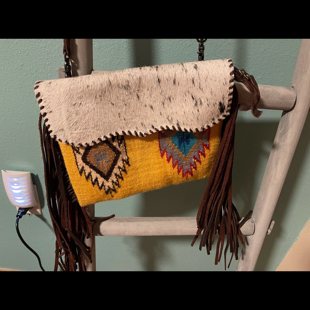 American Darling yellow crossbody with cowhide.